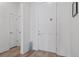 Bright hallway featuring modern design, clean lines, and wood flooring at 5925 La Posada Pl, Parker, CO 80134