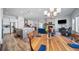 Spacious living room showcasing an open floorplan and modern fireplace at 5925 La Posada Pl, Parker, CO 80134