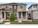 Charming home featuring stone accents, a cozy porch, and a manicured front yard at 5347 Warrior St, Frederick, CO 80504
