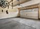 Spacious two-car garage featuring an automatic door and ample room for storage at 5347 Warrior St, Frederick, CO 80504