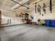 Well-organized garage with storage solutions and space for multiple vehicles and equipment at 5347 Warrior St, Frederick, CO 80504