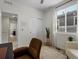 Bright office featuring a window, armchair, desk, office chair, and a closet at 5347 Warrior St, Frederick, CO 80504