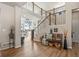 Entryway features wood floors, stairs, and access to the living room at 16231 Thunder Cat Way, Monument, CO 80132