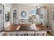 Bright office with a large desk features a large round wall clock at 16231 Thunder Cat Way, Monument, CO 80132