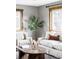 Bright living room with hardwood floors, tree decor, with a cozy and well-decorated seating area at 1908 Taft Dr, Lakewood, CO 80215