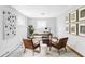 Bright and airy home office with stylish decor, ample natural light, and modern furniture at 1908 Taft Dr, Lakewood, CO 80215