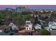 Aerial view of the home with a cityscape in the background at 1655 Wolff St, Denver, CO 80204