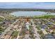Wonderful aerial view showcasing neighborhood and nearby lake, offering a serene and picturesque setting for your new home at 1655 Wolff St, Denver, CO 80204