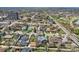 Overhead view of a neighborhood with tree-lined streets and various residential homes at 1655 Wolff St, Denver, CO 80204