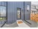 Modern home exterior featuring clean lines, neutral colors, and unique architectural details at 1655 Wolff St, Denver, CO 80204
