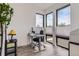 Bright office space with modern desk, chair, and large windows for natural light at 1655 Wolff St, Denver, CO 80204