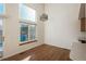 Bright dining area with hardwood floors and large window at 12520 E Cornell Cir, Aurora, CO 80014