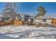 View of home from backyard, deck, and storage shed at 16046 E Harvard Ave, Aurora, CO 80013