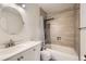 Updated bathroom with a shower/tub, new vanity, and modern fixtures at 16046 E Harvard Ave, Aurora, CO 80013