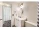 Clean bathroom with updated vanity and shower/tub combo at 16046 E Harvard Ave, Aurora, CO 80013