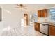 Kitchen with wood cabinets, granite countertops, and stainless steel appliances at 16046 E Harvard Ave, Aurora, CO 80013