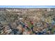 Aerial perspective showcasing the property's neighborhood, proximity to city skyline, and surrounding landscape at 440 S York St, Denver, CO 80209