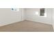 Spacious finished basement room with neutral decor and a window at 440 S York St, Denver, CO 80209