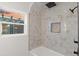 Stylish bathroom featuring a shower/tub combo and updated tile at 440 S York St, Denver, CO 80209