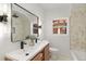 Updated bathroom with double vanity, modern fixtures, and a large walk-in shower at 440 S York St, Denver, CO 80209