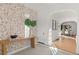 Bright and spacious entryway with unique wallpaper and a modern console table at 440 S York St, Denver, CO 80209