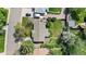 Aerial shot showcases the home, its expansive backyard, and the surrounding neighborhood at 8305 Eaton Way, Arvada, CO 80003