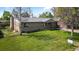 Lovely home featuring a well-manicured lawn and a charming front porch at 8305 Eaton Way, Arvada, CO 80003