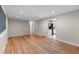 Spacious living room with hardwood floors, open layout, and recessed lighting at 8305 Eaton Way, Arvada, CO 80003