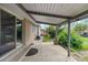 Backyard patio with a sliding glass door and view of the backyard at 8305 Eaton Way, Arvada, CO 80003