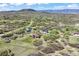 Expansive aerial view of luxury homes nestled in a serene, rural community with rolling hills at 1701 Creedmoor Ct, Castle Rock, CO 80109