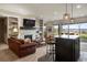 Finished basement recreation room with fireplace and bar area at 1701 Creedmoor Ct, Castle Rock, CO 80109