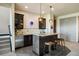 Basement wet bar with a stylish design and seating area at 1701 Creedmoor Ct, Castle Rock, CO 80109