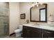 Modern bathroom with a large vanity, shower, and stylish finishes at 1701 Creedmoor Ct, Castle Rock, CO 80109