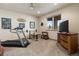 Home gym with treadmill, weights and plenty of space at 1701 Creedmoor Ct, Castle Rock, CO 80109