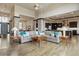 Bright and airy living room with hardwood floors and open floor plan at 1701 Creedmoor Ct, Castle Rock, CO 80109