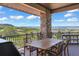 Relax on this deck with stone columns, BBQ grill and sweeping mountain view at 1701 Creedmoor Ct, Castle Rock, CO 80109