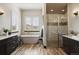 Luxurious Primary bathroom with a soaking tub and walk-in shower at 1701 Creedmoor Ct, Castle Rock, CO 80109