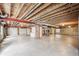Spacious unfinished basement with mechanicals and storage, ready for your custom design and finishing touches at 24783 E Arkansas Pl, Aurora, CO 80018