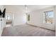 Spacious bedroom has neutral decor and large windows providing plenty of natural light at 24783 E Arkansas Pl, Aurora, CO 80018