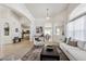 Open-concept living area showcasing seamless flow and an abundance of natural light at 24783 E Arkansas Pl, Aurora, CO 80018