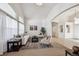 Bright and open living space featuring archways, neutral decor, and a welcoming atmosphere at 24783 E Arkansas Pl, Aurora, CO 80018