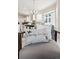 Cozy spot to relax near the dining area with views of the updated kitchen at 24783 E Arkansas Pl, Aurora, CO 80018