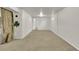 Finished basement with neutral carpeting, recessed lighting, and an open floor plan at 1225 S Honey Way, Denver, CO 80224