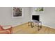 Bright bedroom with hardwood floors and two windows offering natural light at 1225 S Honey Way, Denver, CO 80224