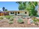 Charming single-story home featuring a drought friendly landscaped front yard at 1225 S Honey Way, Denver, CO 80224