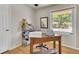 Cozy home office with hardwood floors, a window, and vintage desk at 1225 S Honey Way, Denver, CO 80224