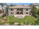 Aerial view of house highlighting the backyard and landscaping at 9005 Stonecrest Way, Highlands Ranch, CO 80129