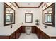 Elegant bathroom with dual vanities and a large mirror at 9005 Stonecrest Way, Highlands Ranch, CO 80129