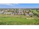 Aerial view of a luxury community with golf course at 9005 Stonecrest Way, Highlands Ranch, CO 80129