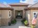 Inviting entryway with stonework and a charming front door at 9005 Stonecrest Way, Highlands Ranch, CO 80129